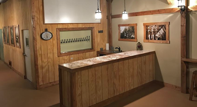 Civil war photos and rustic wood trim decorate Ramona's new Smoking Cannon Brewery. 