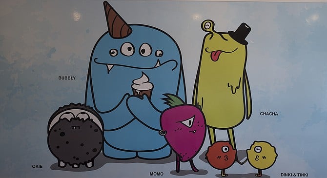 Monsters roam the walls of this ice cream shop.
