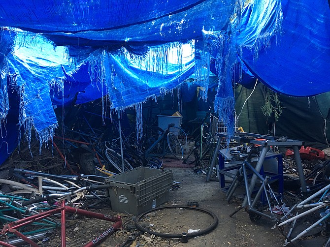 Councilmember Sherman kicked off the meeting by showing a slideshow of a large homeless camp with hundreds of stripped down bicycles that had been discovered along the San Diego River last week.