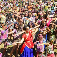 Lots of yoga, lots of dust at the Holi Festival