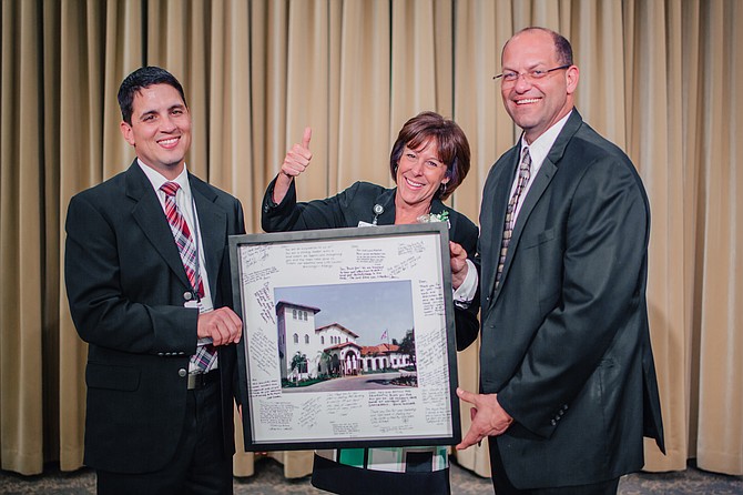 Left to right: Don Maes, Mount Miguel’s facilities management director, was recognized by Terri Cunliffe, CRC president and CEO, and Rich Miller, executive director at Mount Miguel, for his exceptional service overseeing the construction of the Peterson Life Center. The framed photograph of Peterson Life Center is signed by Mount Miguel and CRC’s leadership team.
