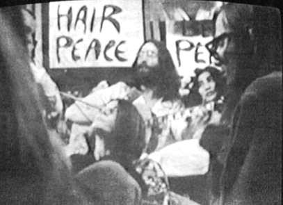 Williams (right) at Bed-In for Peace. When we got there, John and Yoko were in bed, of course, in a huge hotel room with a fair crowd of cameramen and Hare Krishnas and newspaper reporters.