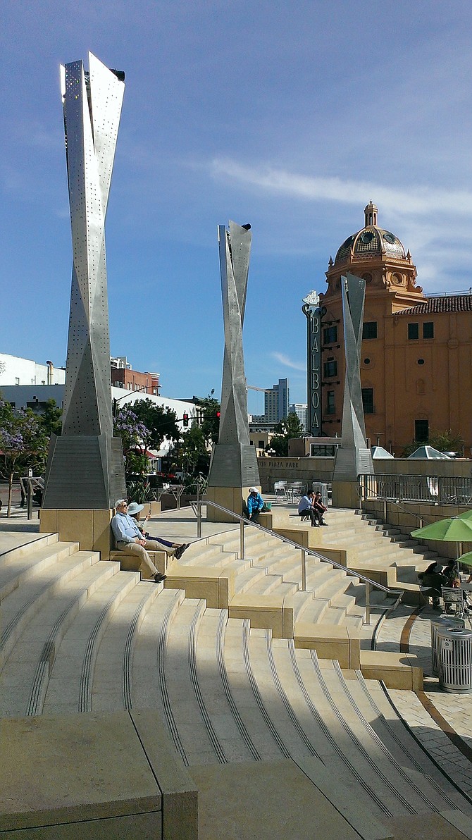 Horton Plaza, with people kicking back on the steps.