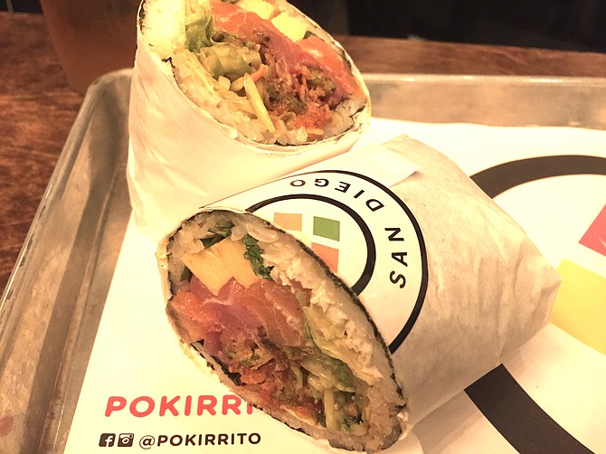 The Pokirrito Classic is a sushi burrito with tuna, crab meat, tamago, and broccoli slaw.