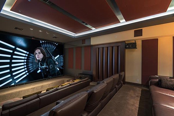 Acoustically engineered theater with Crestron home automation
