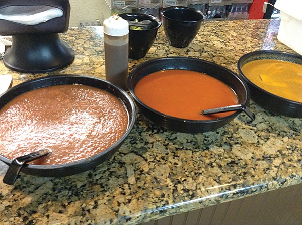The salsas, made here: verde, roja, naranja.
