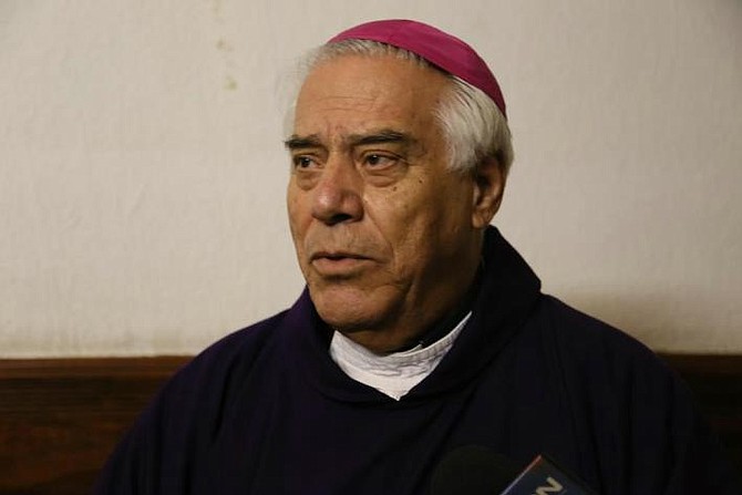 Archbishop Emeritus Romo has defended his handling of the new cathedral project.