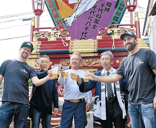 Circle 9 Brewing's founders share their Nagayama rice lager at the Iwase Hikiyama fighting float festival
