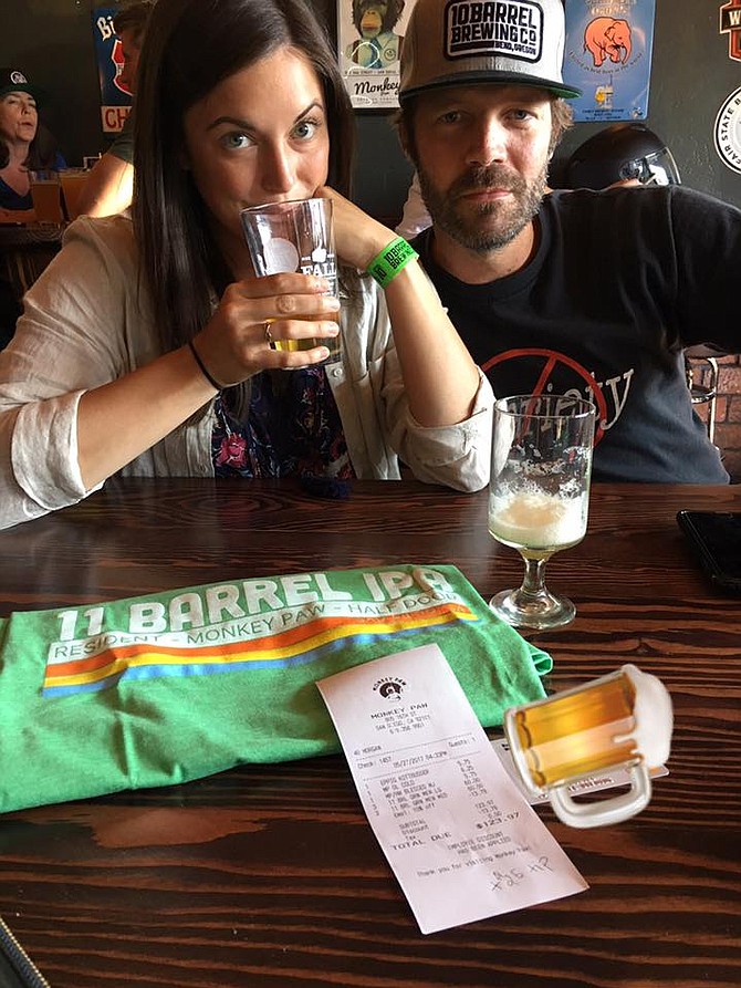 In response to a Facebook-issued challenge, 10 Barrel brewer Ben Shirley patronizes Monkey Paw to buy beer and a t-shirt with a company credit card.