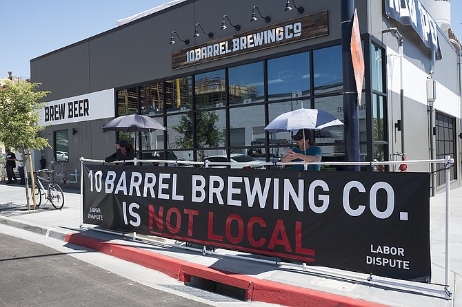 San Diego's Local 1506 carpenter's union is picketing 10 Barrel for not hiring local contractors to build its multi-million dollar brewpub.