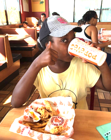 Meghann O'Connor: it's cheaper to fill up on junk food. (Photo of Popeye's on Plaza Blvd.in National City)