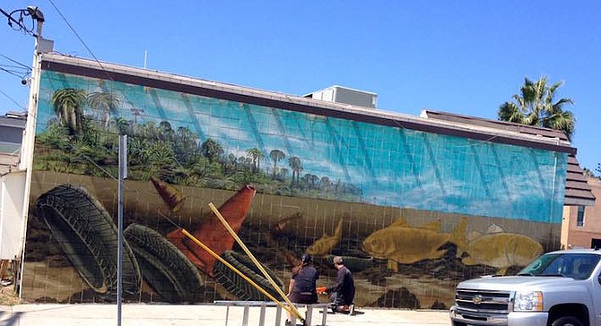 Hebets putting final touches on mural - Image by Mitchell McKay