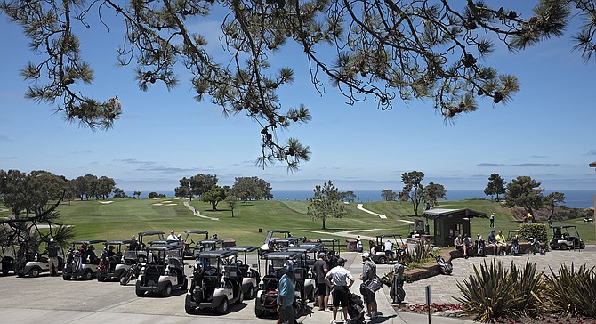 The view from The Grill at Torrey Pines deck includes golf carts