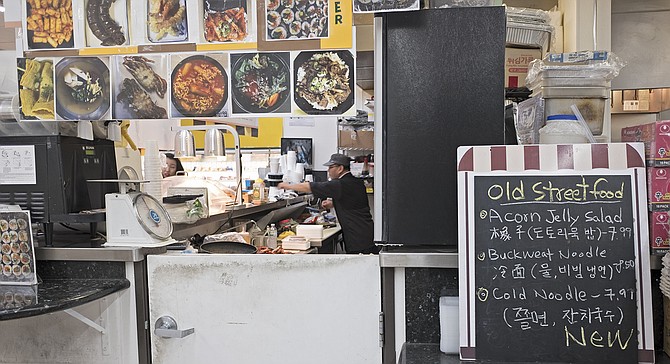 You’ll find Old Street Food in the back left corner of Zion Market
