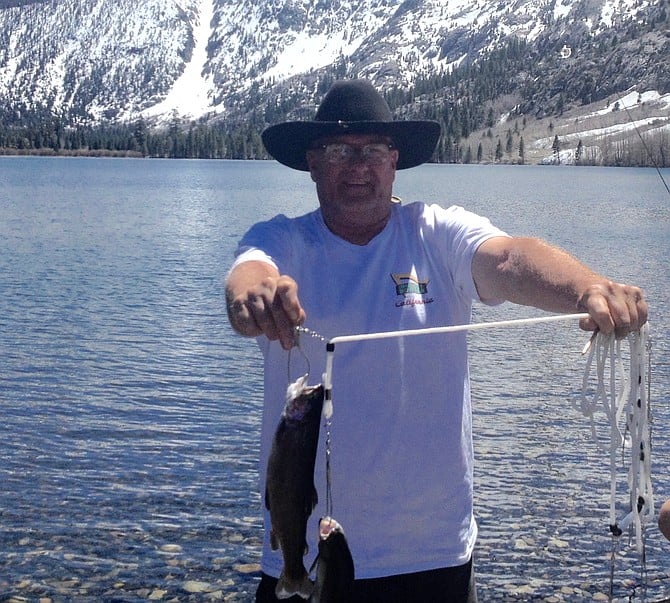 Reader stringer Ken Harrison shows off his catches from 2017 opening day at Silver Lake.