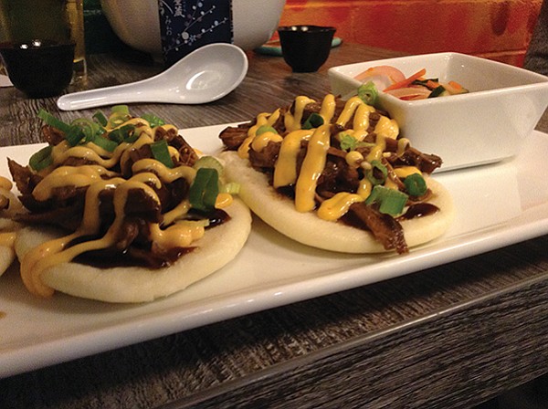 Bao bun tacos — brisket or pork belly with Sriracha aioli, $7