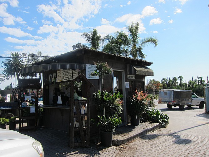 Clients can drive onto the nursery and use their car as a shopping cart. This kiosk at the entrance/exit is where customers pay for their purchases. 