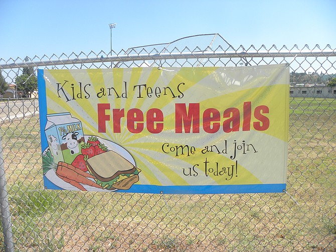 Your tax dollars at work thanks to the USDA. This sign is on the fence at Del Dios Academy, Escondido where snacks and meals are served year-round.