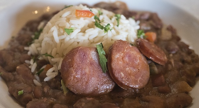 The favorite: K Paul andouille sausage medallions on top of red beans and rice