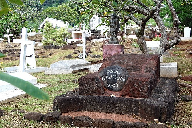 Painter Paul Gauguin's final resting place at the graveyard in Atuona, Hiva Oa, where Belgian singer Jacques Brel is also buried.