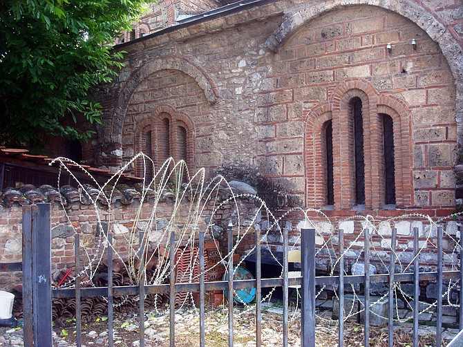 Barbed wire surrounds many churches