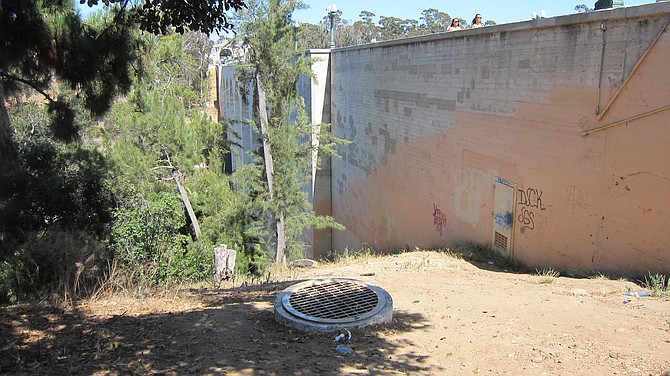 Transients are accessing the bridge through abutment doors and manholes which both lead to the interior of the bridge.  