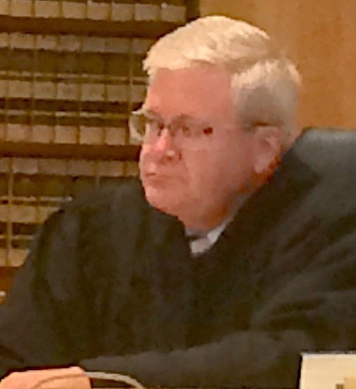 Judge Dahlquist wants a financial statement and all passports from the defendant