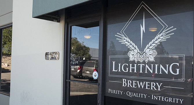 The lights are still on, and beer being served at Lightning Brewery.
