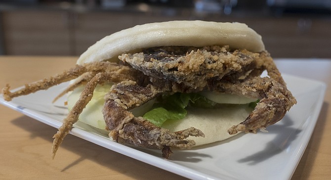 Soft shell crab, tempura fried and served in a bao