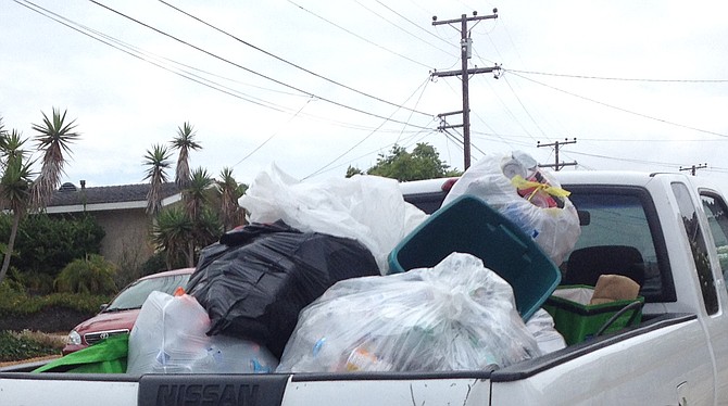 This truck hangs out a lot with the Tioga camper. It's often seen overflowing with recycling and trash. 