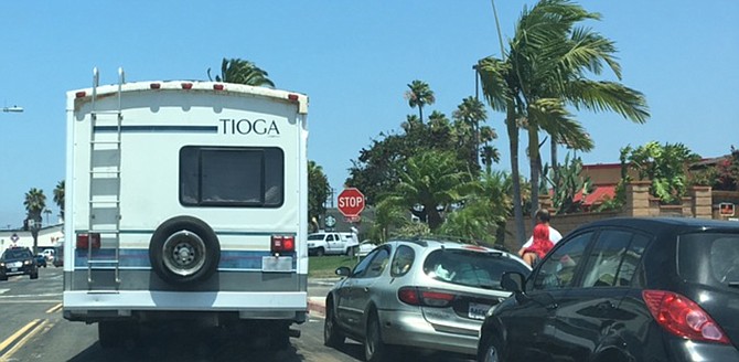 A neighbor spotted the Tioga camper a few days after being towed cruising through the neighborhood. 