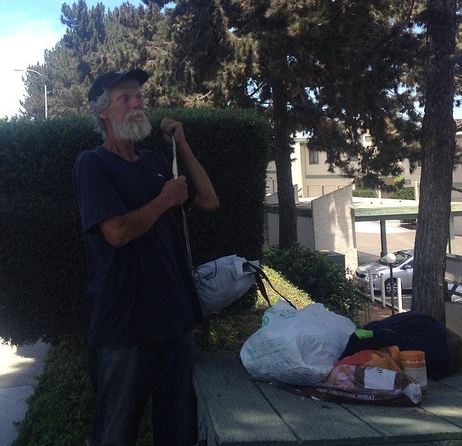 On July 27, a neighbor told me a homeless guy was hiding in the bushes near my residence — he was making a sandwich when I approached. 