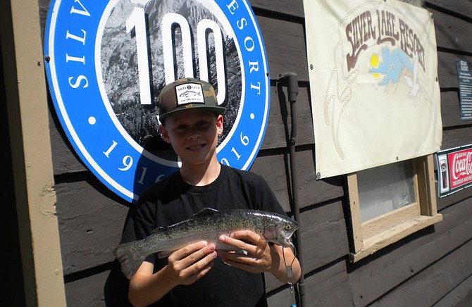 Chase Johnson from Encinitas landed this nice 1 pound 12 ounce Rainbow fishing from the shore of Silver Lake using Garlic Power Bait