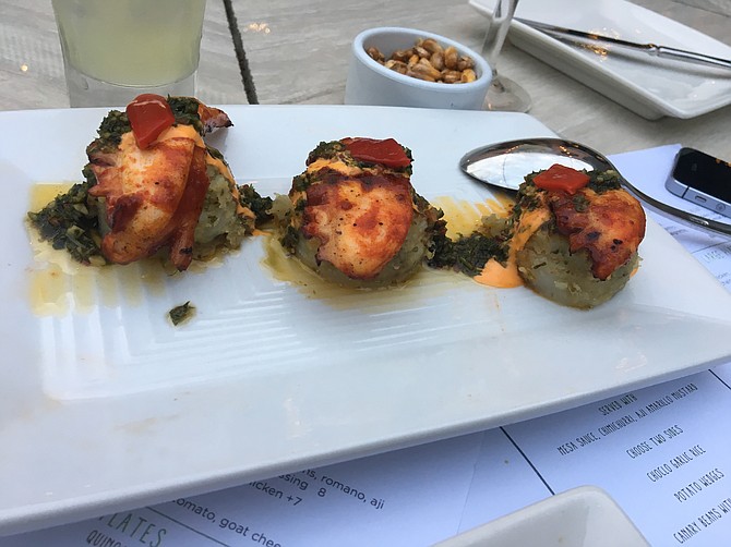The grilled octopus appetizer at Pisco is served on top of chimichurri potatoes.