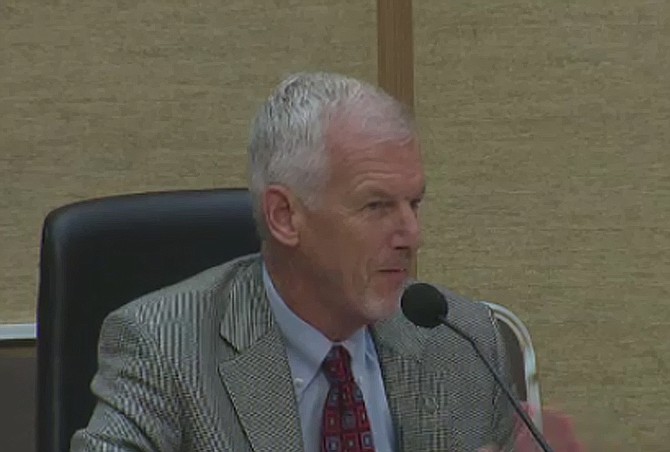Commissioner James Whalen asked, "I just want to make sure - did this applicant get away with anything?" 
