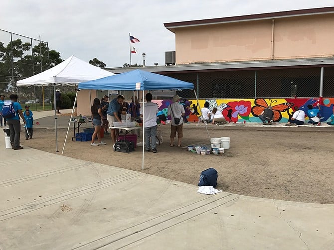 A new mural is one step toward sprucing up the dusty playground behind Golden Hill Recreation Center; a nature play area is coming soon