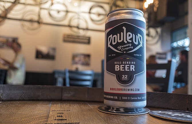 32 ounces of beer canned on demand by Rouleur Brewing's crowler machine.