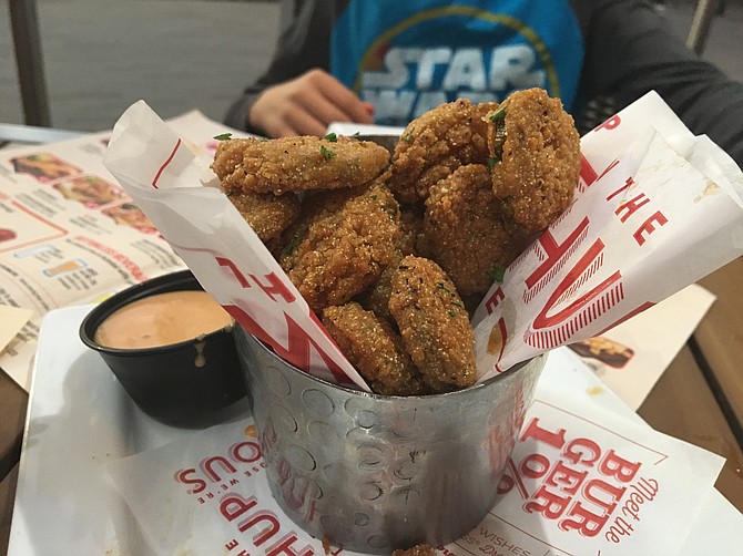 The deep-fried pickles come with "campfire" sauce on the side. It's a mix of BBQ sauce and ranch dressing.