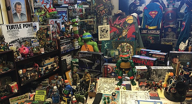 Kevin Eastman (upper left) looks down upon a re-creation of his turtle-infested studio at the San Diego Comic Art Gallery.