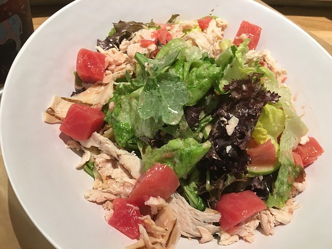 The Save Drake Farm's Salad has roasted chicken, beets, goat cheese, green apples, cranberries, almonds, red onions and greens topped with a citrus vinaigrette.