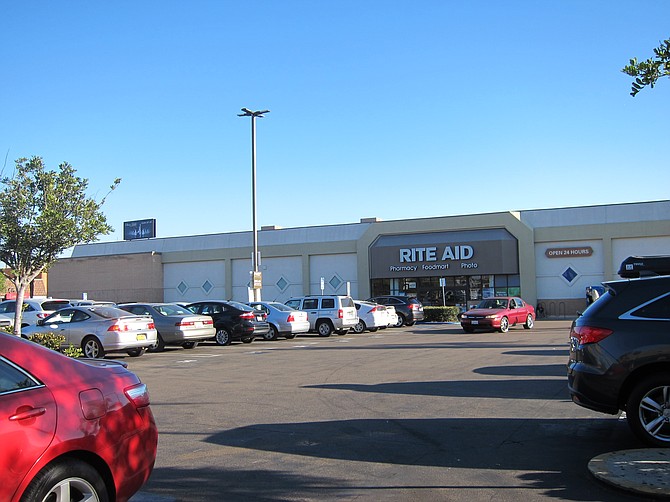 The Rite Aid parking lot (Robinson and Fifth) is the proposed location for a multistoried parking garage.