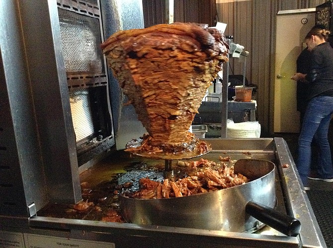The trompo of pork al pastor. Hour and a half to make, six hours to sell out.