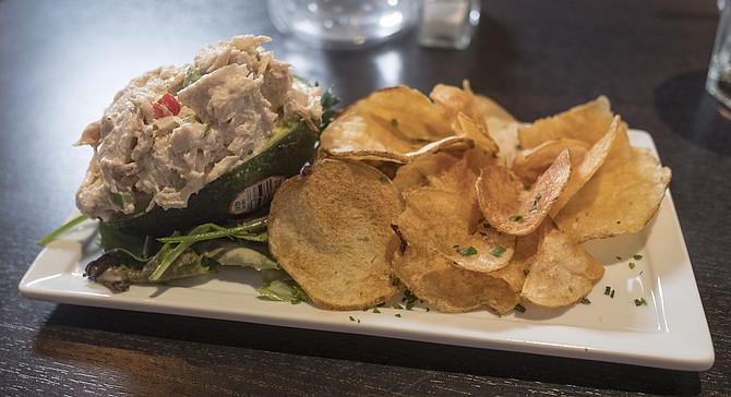 Chicken salad stuffed avocado with house-made potato chips