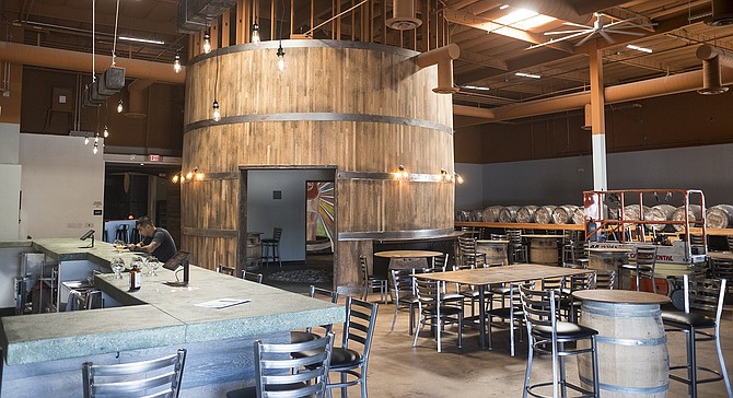 A large barrel shaped space is the centerpiece of Wild Barrel's tasting room