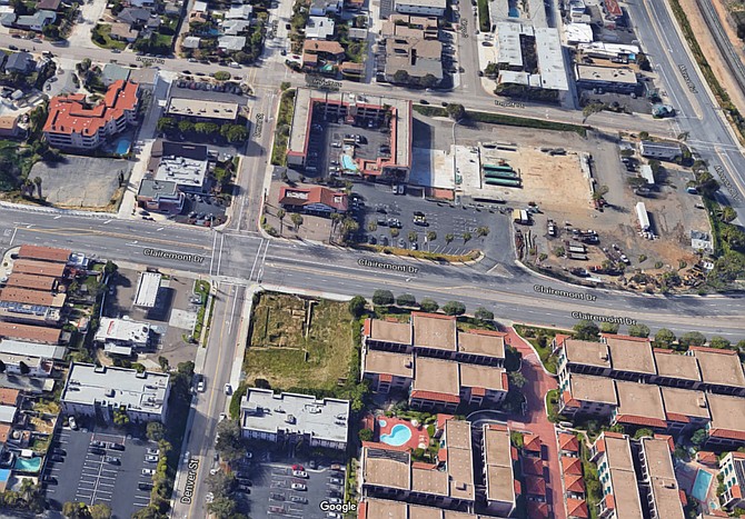 The Washman isn't the only blighted lot a block up from scenic Mission Bay Park getting a makeover. Across the street is busy with new trolley construction.