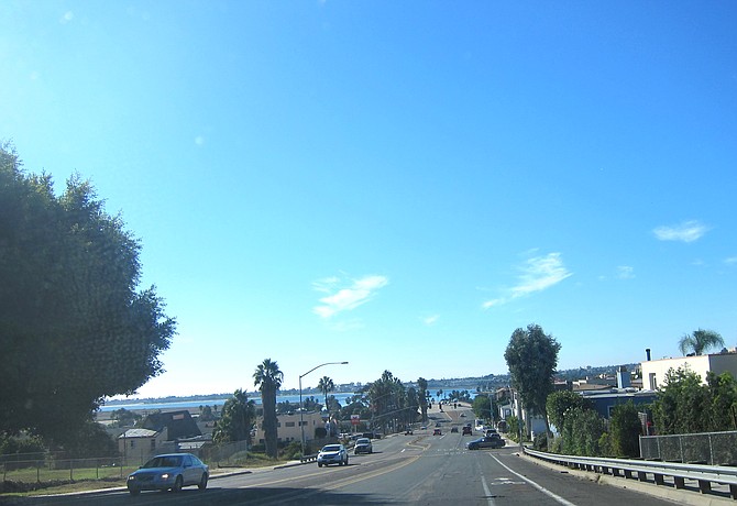 The view from up the hill and down the hill to Mission Bay Park.