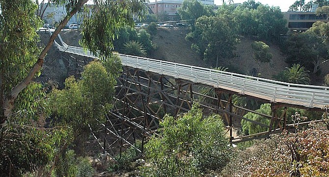 Quince Street bridge. In 2011, wind caused a eucalyptus to partially destroy the handrails near Fourth Avenue.