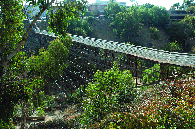 Quince Street bridge. In 2011, wind caused a eucalyptus to partially destroy the handrails near Fourth Avenue.