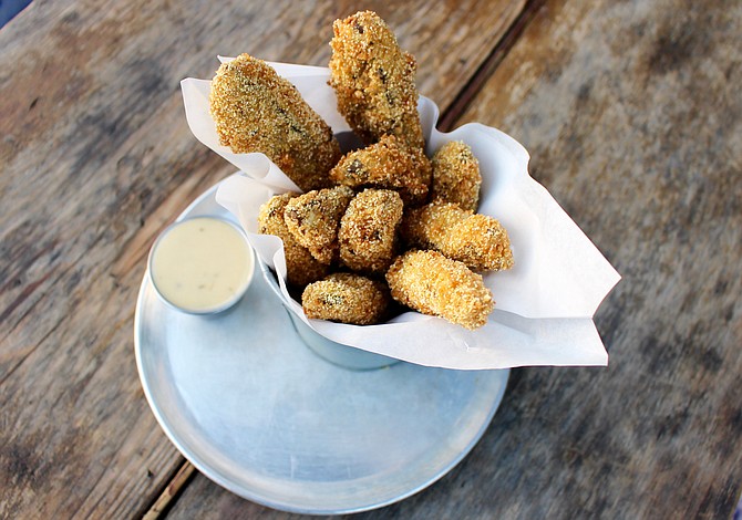 The fried portobello mushrooms are served with a rosemary dipping sauce.