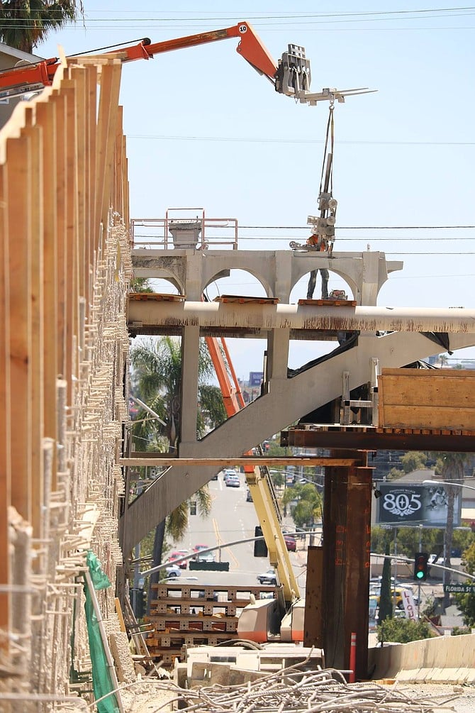 May watched the workers painstakingly cutting out piece by piece to save those three arches. (photo: Gregory's San Diego)